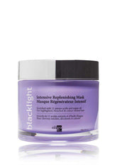 Masque réplenissant Blacklight pour cheveux brillant et nourri.