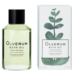 Bouteille Olverum huile-bain luxueuse prête à être versée pour un moment de calme.