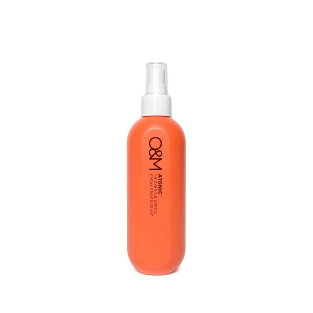 O&M Atonic brume épaisseur cheveux sur bouteille, pour plus de corps et volume.