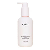 Crème OUAI Anti-Frizz dans sa bouteille, hydratation durable et contrôle des frisottis.