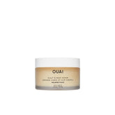 OUAI gommage pour cuir chevelu et corps Melrose Place sur bouteille format voyage.