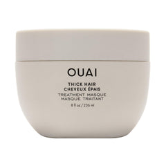 OUAI Masque Cheveux Épais – bouteille du produit, nourrissement profond pour cheveux cassants.