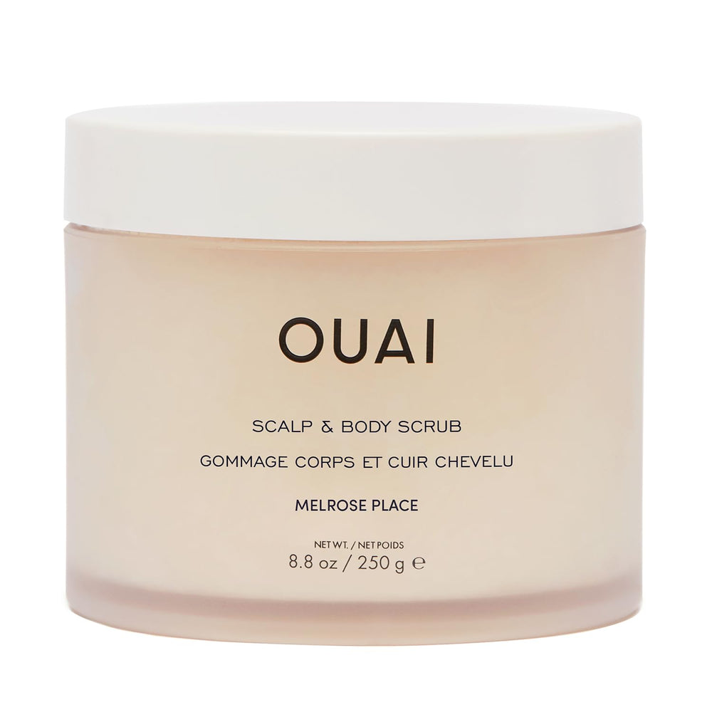 OUAI Scalp & Body Scrub emballage élégant pour exfolier cuir chevelu et corps.