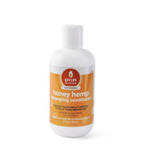Conditionneur miel-chanvre Oyin Handmade, bouteille: soin nourrissant pour cheveux secs et brillants.