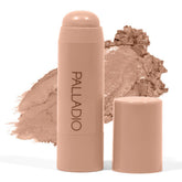 Palladio stick luminiseur crème sur les pommettes pour un éclat subtil et durable.