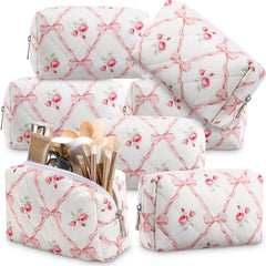 Paterr sac maquillage quilté avec nœud rose, rangement élégant pour maquillage quotidien.