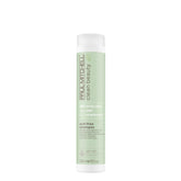 Paul Mitchell Clean Beauty Anti-Frisottis Shampoo – flacon, lissage de la surface capillaire et frisottis réduits.