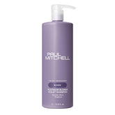 Shampooing violet Paul Mitchell, bouteille: élimine les tons bruns et ravive les blondes.