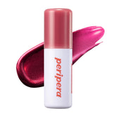 Peripera Ink Peel Off Lip Stain montre la bouteille et une teinte longue tenue.