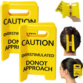 Pinces à cheveux avertissement jaune avec dents larges et prise fiable.