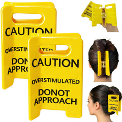 Pinces à cheveux avertissement jaune avec dents larges et prise fiable.