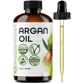 Premium Nature Huile d’Argan pure pressée à froid en bouteille, hydratation efficace.