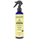 PURA D'OR Argan Oil Heat Shield bottle pour showing moisture boost