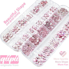 Qiipii 24 Styles – formes variées rose clair avec dos plats pour nail art précis.