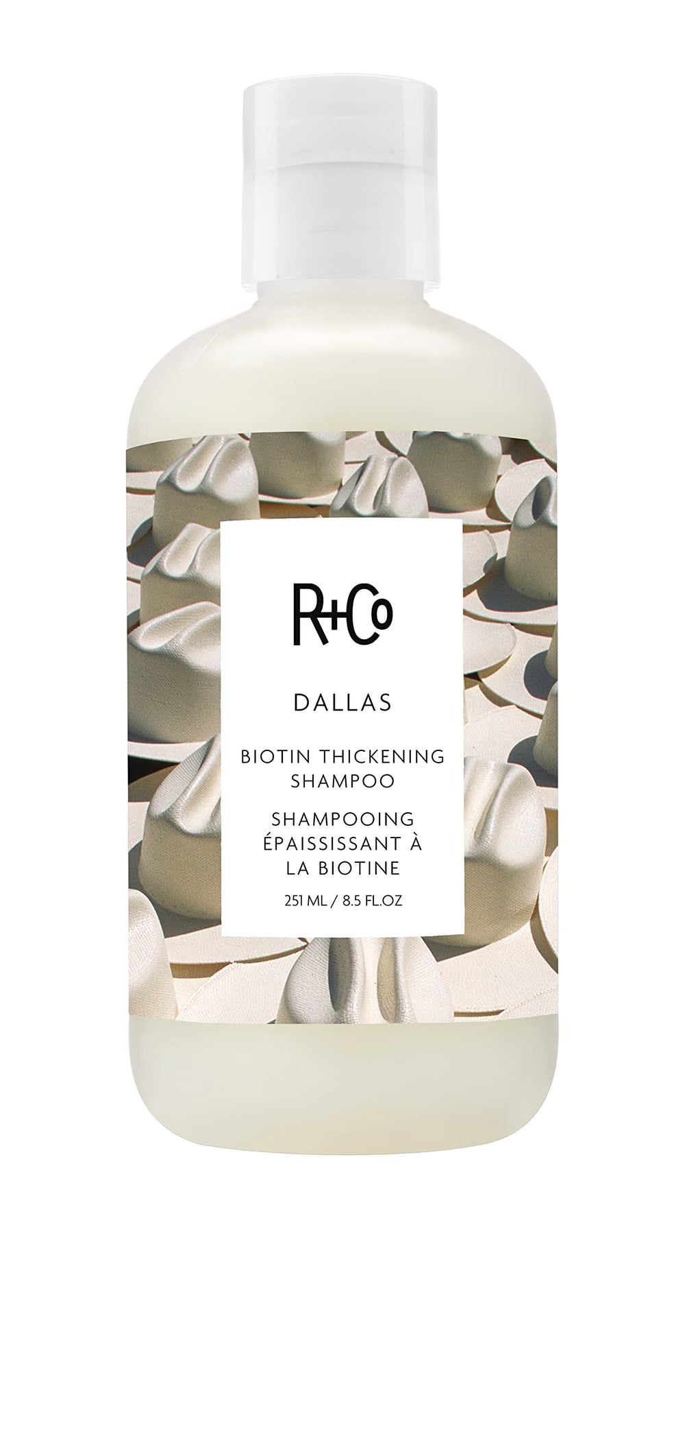 R+Co Dallas shampoing épaississant, bouteille élégante, apporte volume aux cheveux fins.