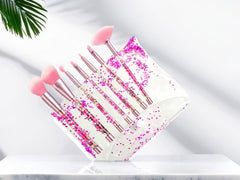 Étui RAEEIKPHZ avec pinceaux glitter rose, rangement sûr et protégé.