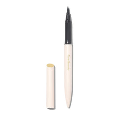 Rare Beauty Perfect Strokes Matte Flacon et pinceau pour tracé net.