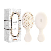 RHOS Mini brosse cheveux en poche, pratique pour les déplacements et les retouches.