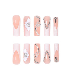 RikView ongles adhésifs blancs brillants avec motifs fleurs 3D.