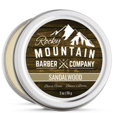 Baume barbe Rocky Mountain Barber dans son pot, parfum boisé pour une allure riche.