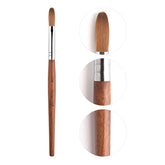 Rolabling nail brush close-up highlights Kolinsky Sable bristles for precise acrylic application.