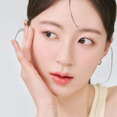 rom&nd Juicy Lasting Tint 31 Bare Apricot : texture légère sans effet collant.