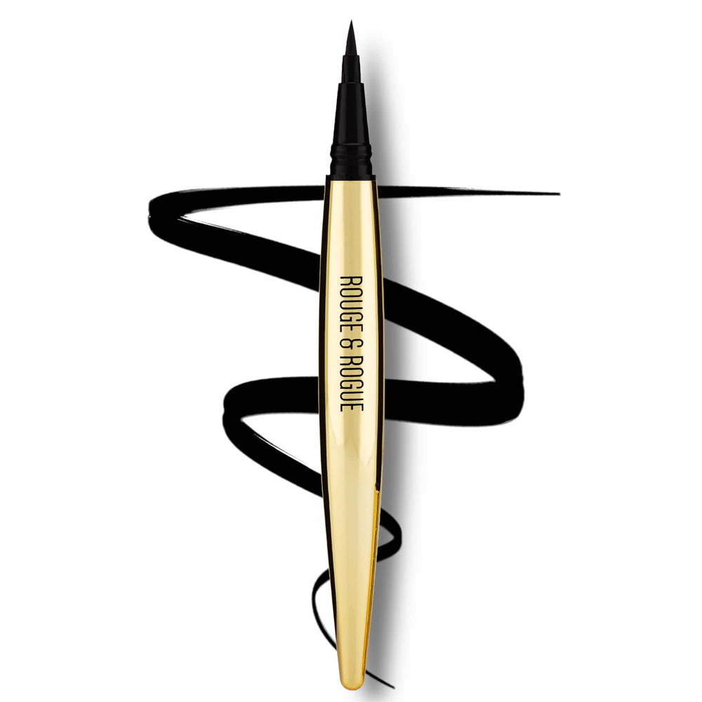 Rouge & Rogue trait yeux liquide ultra noir avec brosse de précision pour un trait net.