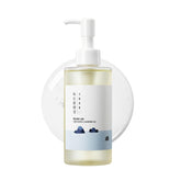 ROUND LAB Dokdo huile nettoyante visage: bouteille élégante pour un soin quotidien doux.