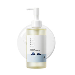 ROUND LAB Dokdo huile nettoyante visage: bouteille élégante pour un soin quotidien doux.