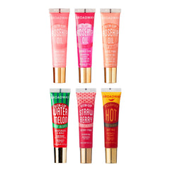 Ruby Kisses Broadway Vita-Lip gloss rose-brillance, hydratation durable pour des lèvres lumineuses.
