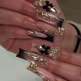 Ongles RUOKEXIN noirs à pointe française, élégants et durables pour salon ou usage quotidien.