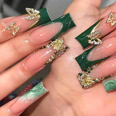 Ongles RUOKEXIN press on vert avec pointe francaise doree, look chic durable