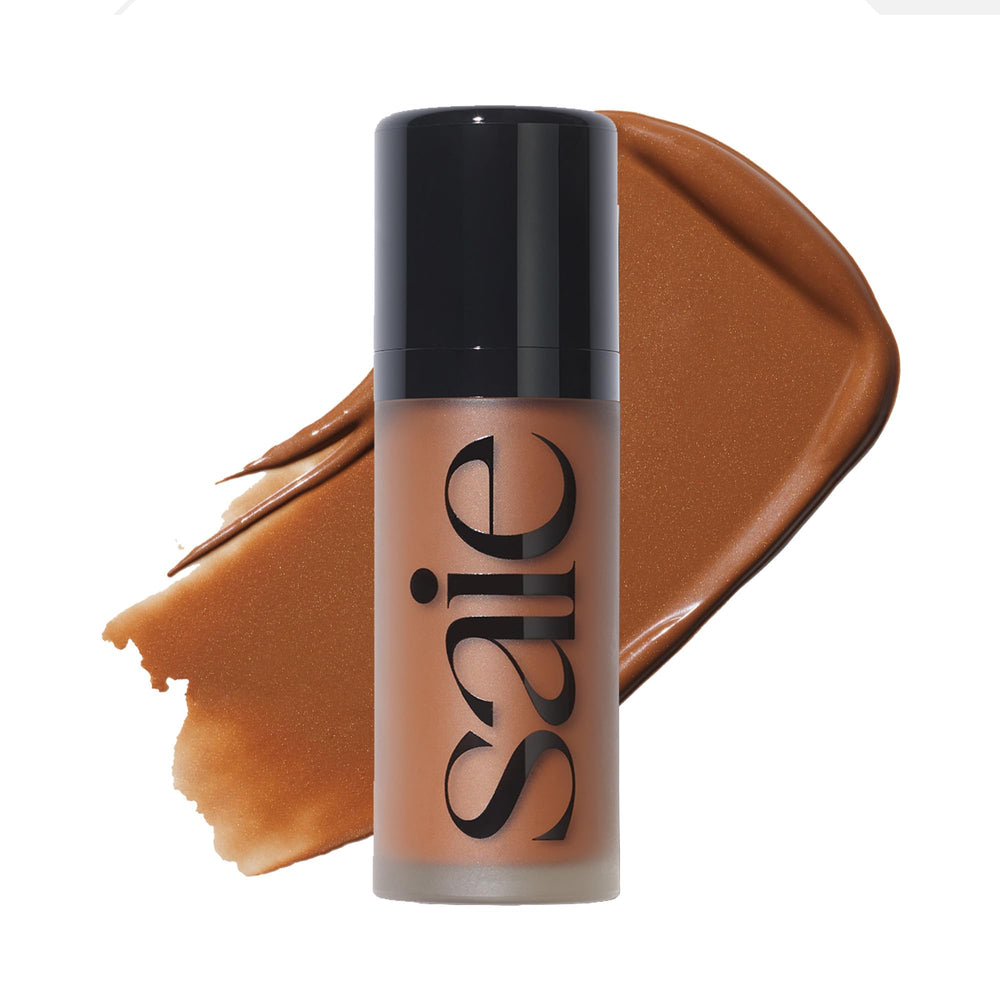 Saie Dew Bronze avec embout applicateur tête boule pour précision ciblée sur les pommettes.