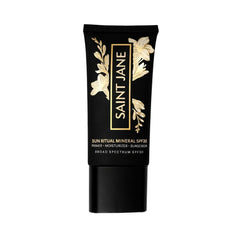 SAINT JANE Luxury Sun Ritual - emballage floral luxueux prêt pour la routine solaire.