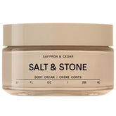 Salt & Stone Crème pour le corps – bouteille Safran & Cèdre, parfum durable.