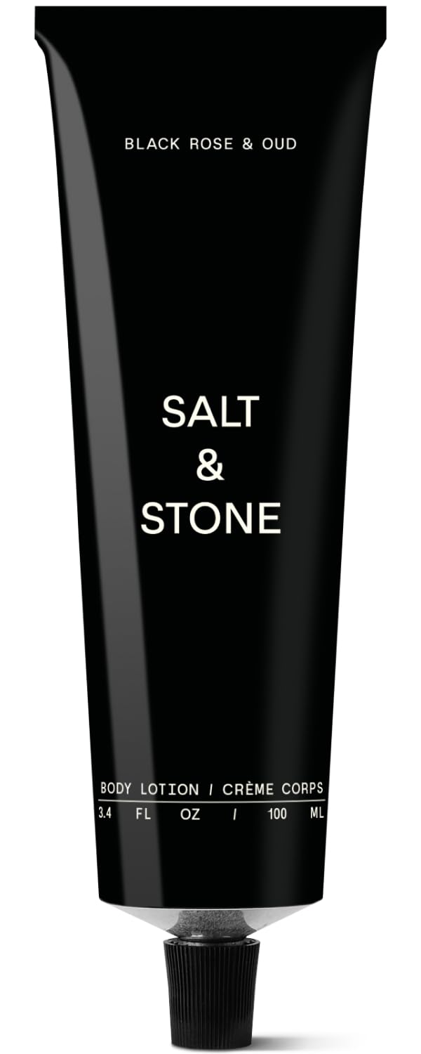 Salt & Stone Body Lotion - flacon noir et oud, hydratation rapide pour la peau.