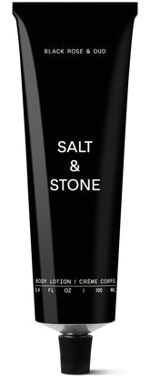 Salt & Stone Body Lotion - flacon noir et oud, hydratation rapide pour la peau.