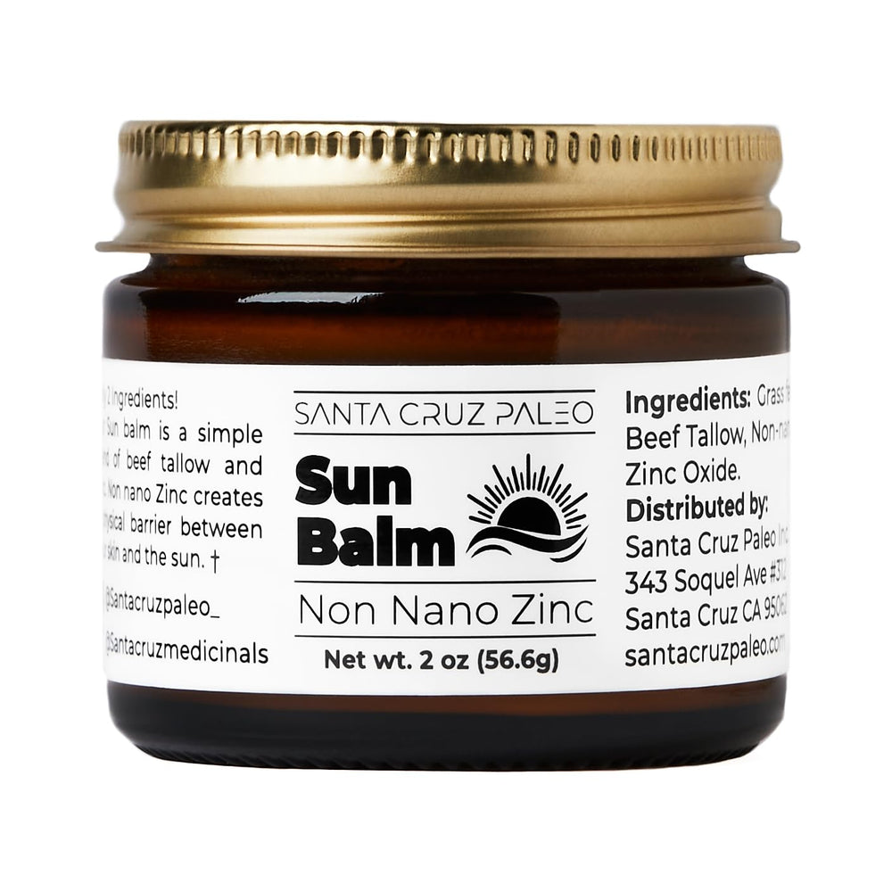 Santa Cruz Paleo beef tallow sun balm applied to the face for hydration and protection