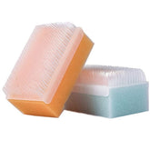 Scalp Scrubbie loofah stérilisée avec croûte de lait; soin en douceur du cuir chevelu.