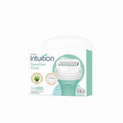 Rasoir Schick Intuition avec cartouches sensibles pour un rasage pratique et hydratant.