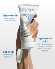 Applying Seaweed Bath Co Calm Body Cream on hand for quick moisture