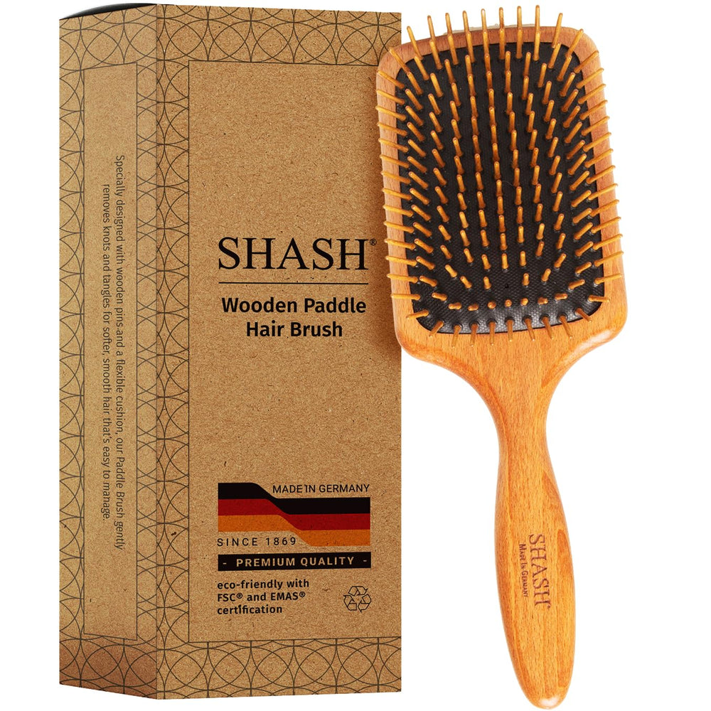 SHASH brosse paddle en bois démontrant un démêlage en douceur pour tous types de cheveux.