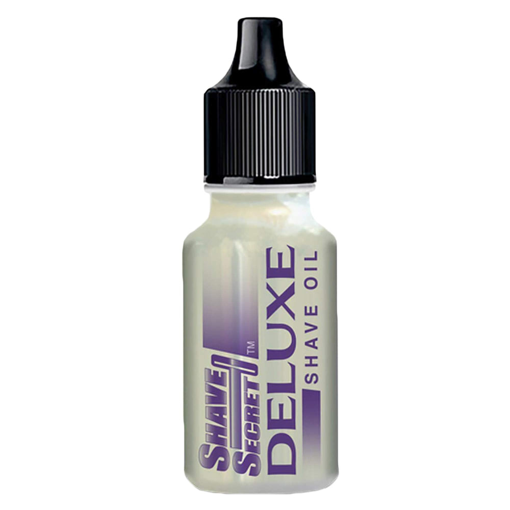 Shave Secret Deluxe Huile de rasage en bouteille, glisse douce et absorbtion rapide.