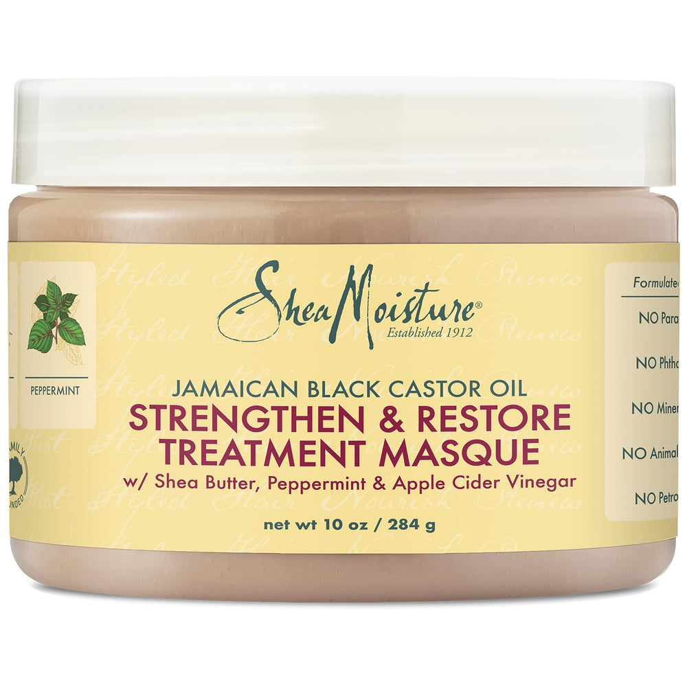 Application du masque SheaMoisture Jamaican Black Castor Oil sur les cheveux.