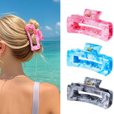 Pinces Shinlea griffe rose design encre pour coiffure chic et durable.
