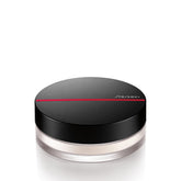 Shiseido Synchro Skin Invisible Silk Poudre Libre – Bouteille élégante, contrôle de brillance discret.