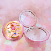 SHOWLOUE Miroir compact ouvert: retouches rapides en déplacement.