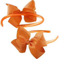 Bandeau SIQUK avec nœud rose clair, ajout charmant pour les coiffures quotidiennes.