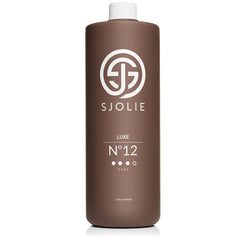 SJOLIE SUNLESS Luxe12: bouteille violet, teinte bronzée uniforme.