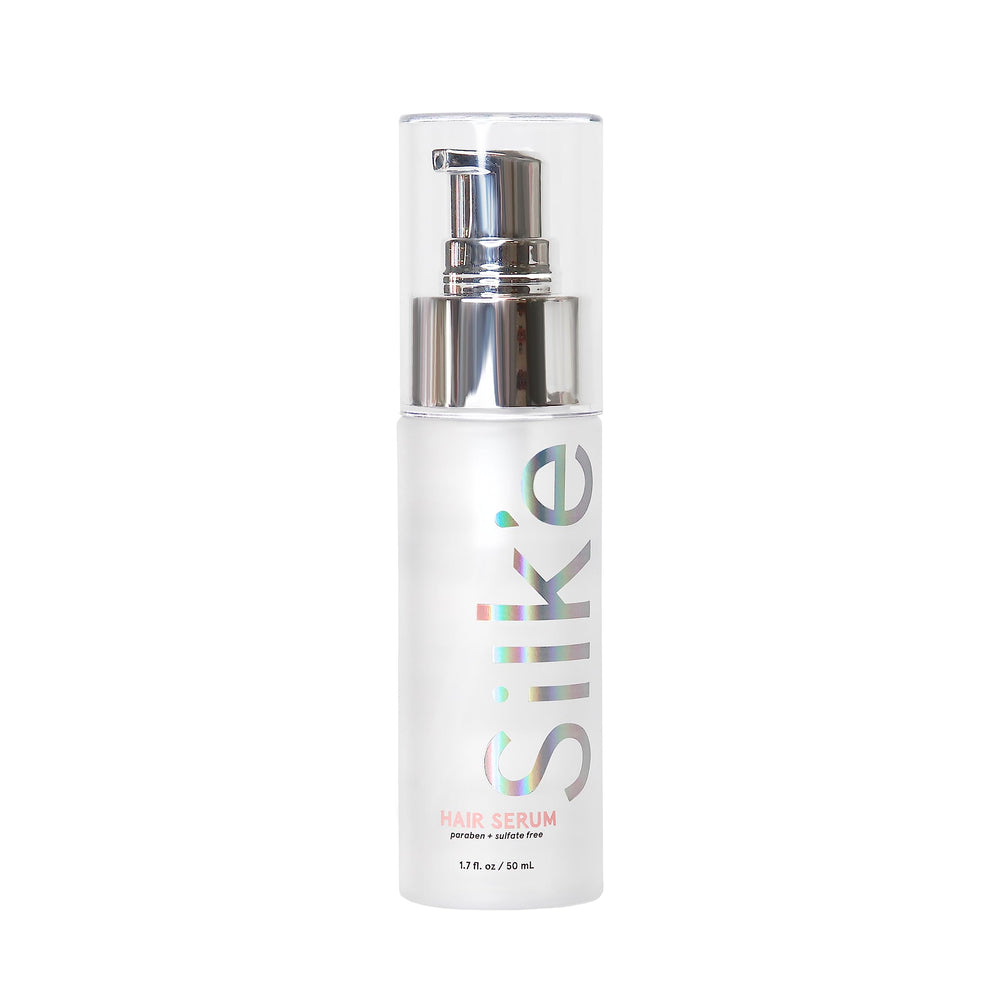 Sleek'e Silk'e sérum réparateur dans sa bouteille, application facile pour cheveux soyeux.